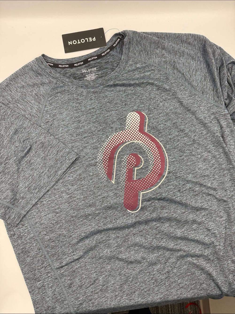 Peloton Men's Blue Grey Heather Short Sleeve Logo Tee with Maroon Accent